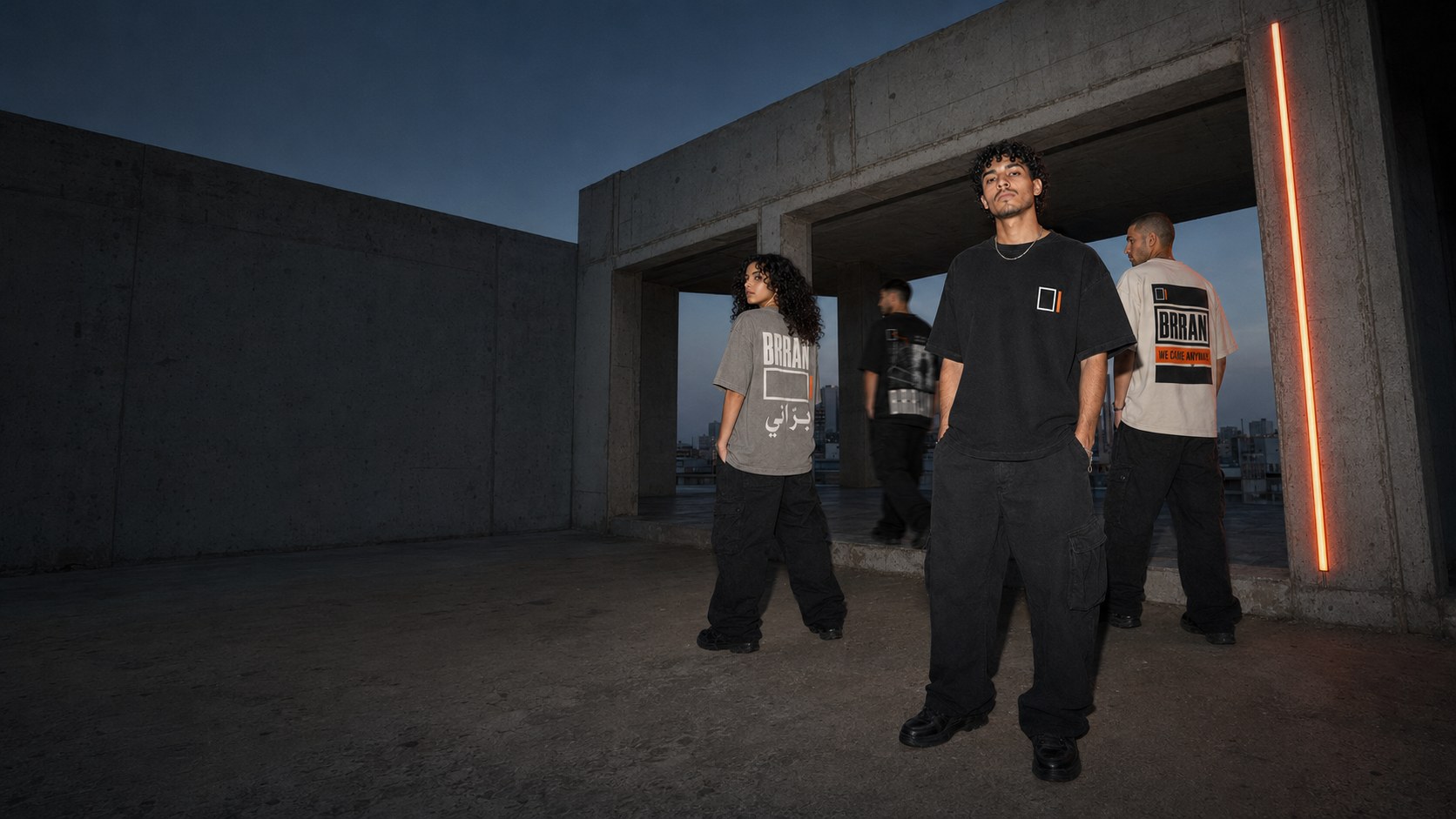 BRRANI OUTSIDE_001 campaign, four models on a brutalist Casablanca rooftop at blue hour with an orange practical light